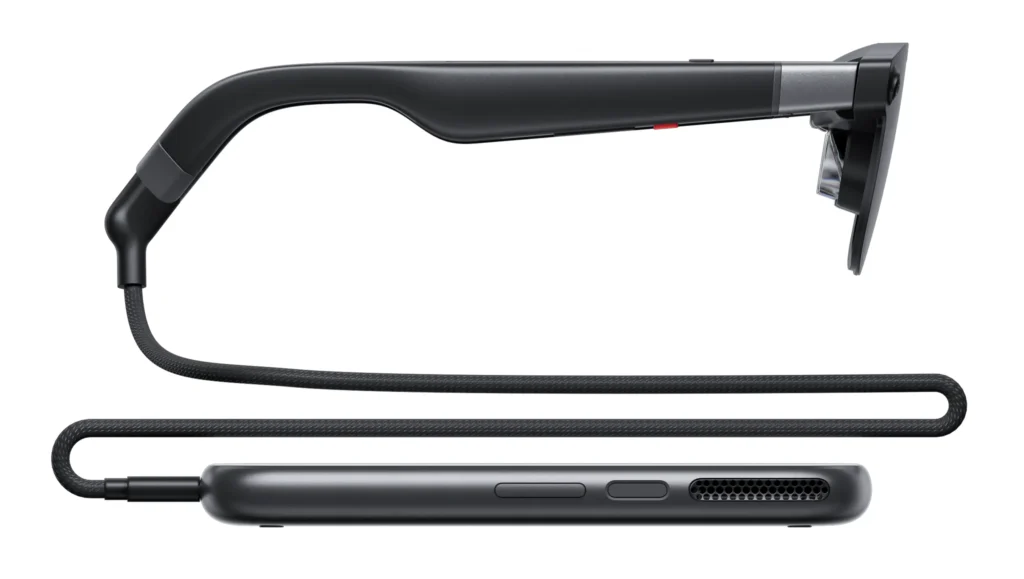 XREAL Aura optical see-through glasses beside the Android XR computing puck